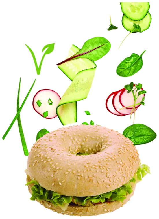 Vegan bagel with cucumber, radish and salad