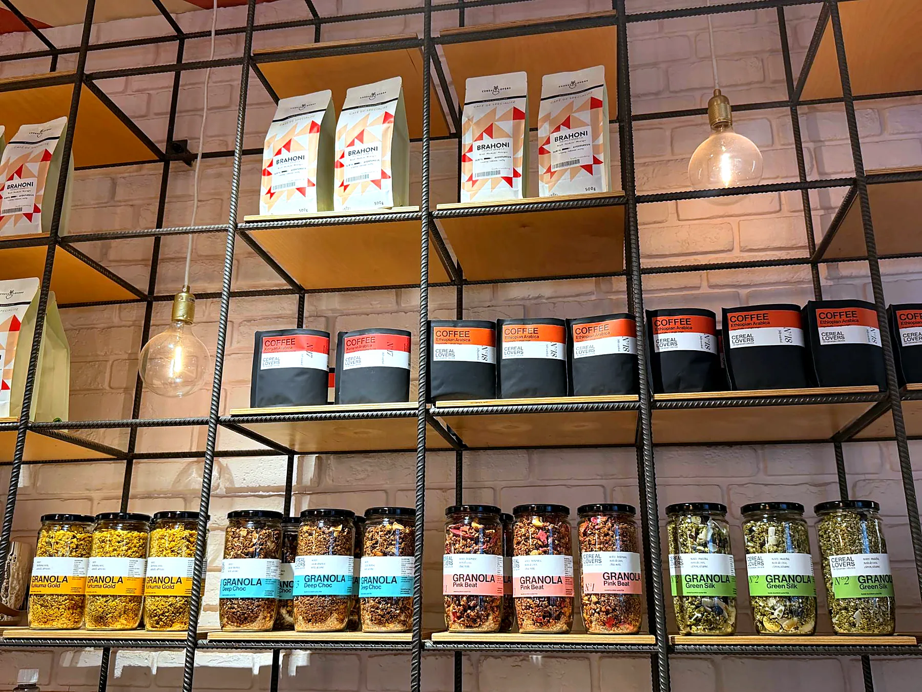 The wall: granola jars and coffee bags on the shelves